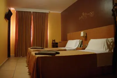 Cama o camas de una habitación en Hotel Solsona Centre