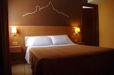 Cama o camas de una habitación en Hotel Solsona Centre