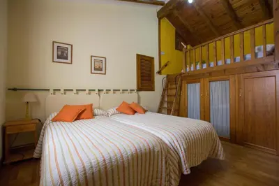 Cama o camas de una habitación en Casa Villazón I - Camino de Santiago