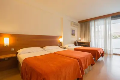 Cama o camas de una habitación en Hotel Torre Monreal