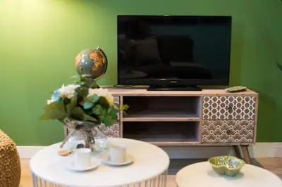 Una televisión o centro de entretenimiento en Apartamentos4U Tudela Centro - Parking incluido