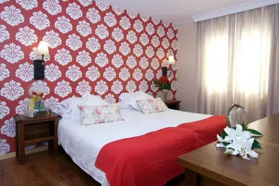 Cama o camas de una habitación en Hotel del Carme