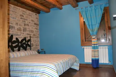 Cama o camas de una habitación en Apartamentos La Era