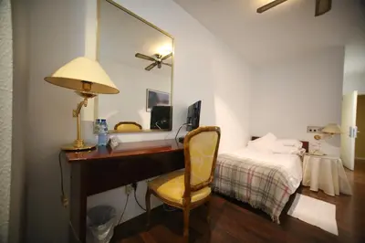 Cama o camas de una habitación en Hotel Pintor Marsà