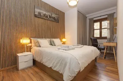 Cama o camas de una habitación en El Escondite de Biescas
