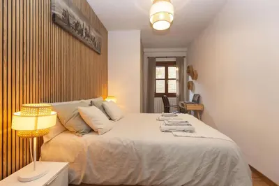 Cama o camas de una habitación en El Escondite de Biescas