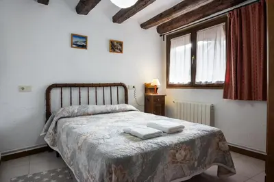 Cama o camas de una habitación en Casa Rural Baró
