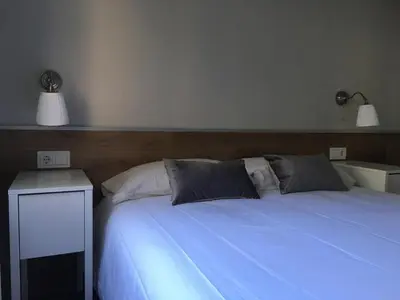 Cama o camas de una habitación en Apartaments La Pertusa 1r piso