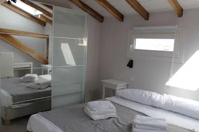 Cama o camas de una habitación en Apartamentos Elizondo Center