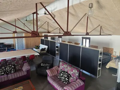 Zona de estar de loft el taller
