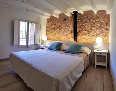 Cama o camas de una habitación en Cal Moreno