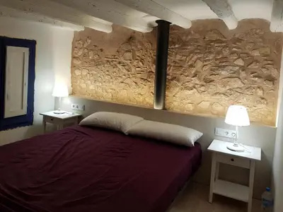 Cama o camas de una habitación en Cal Moreno
