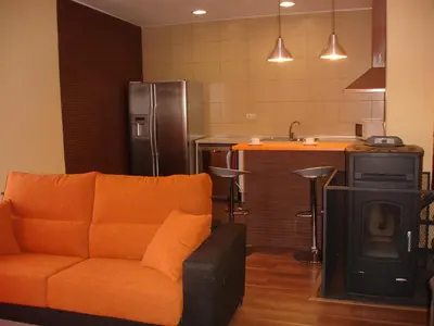 Una cocina o zona de cocina en Apartamentos La Muralla