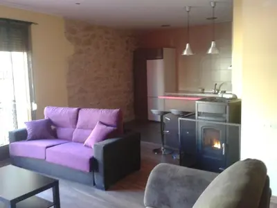 Zona de estar de Apartamentos La Muralla