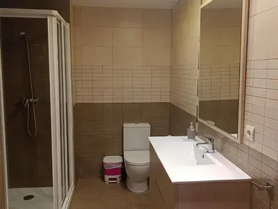 Un baño de Apartamentos La Muralla
