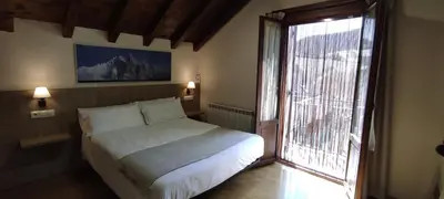 Cama o camas de una habitación en HOSTAL MENDILATZ