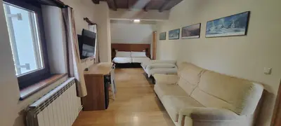 Cama o camas de una habitación en HOSTAL MENDILATZ