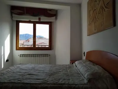 Cama o camas de una habitación en APARTAMENTO QUINTO