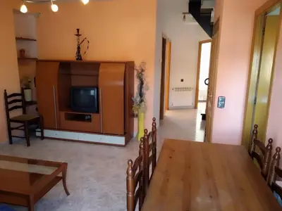 Una televisión o centro de entretenimiento en APARTAMENTO QUINTO