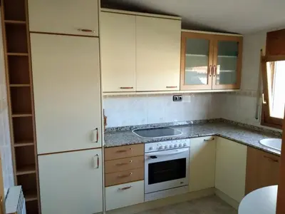 Una cocina o zona de cocina en APARTAMENTO QUINTO