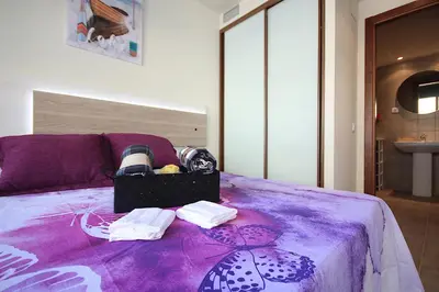 Cama o camas de una habitación en Romantic Loft