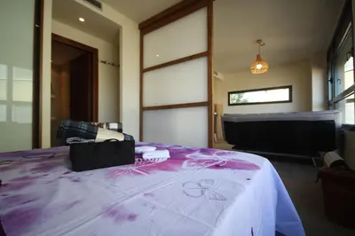 Cama o camas de una habitación en Romantic Loft