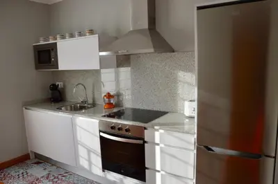 Una cocina o zona de cocina en Apartamentos Montejurra