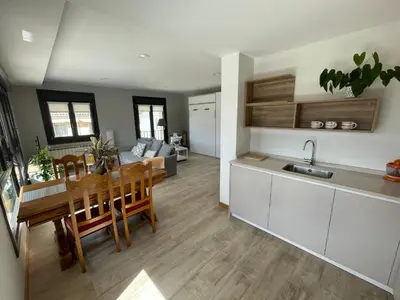 Una cocina o zona de cocina en Apartamentos Montejurra