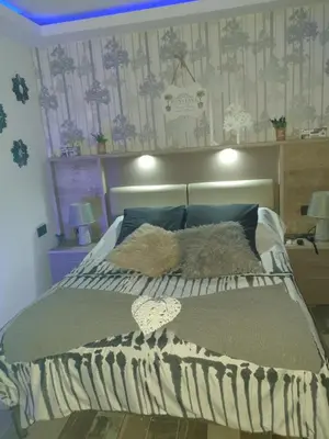 Cama o camas de una habitación en LA VEGUILLA DELUXE JACUZZi