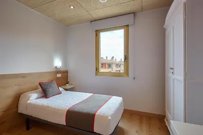 Cama o camas de una habitación en Hostal Nobadis
