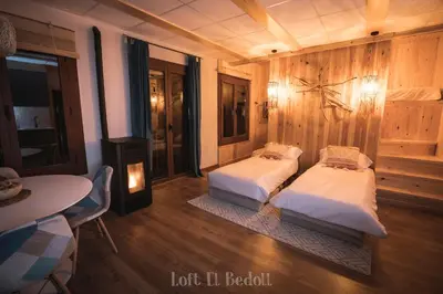 Cama o camas de una habitación en Abadía de Montenartró Apartamentos