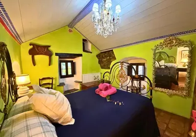Cama o camas de una habitación en Casa Abadía de Banaguás
