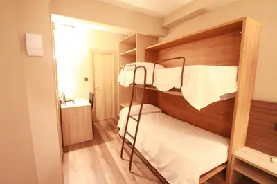 Cama o camas de una habitación en Hotel, H de l'Anton