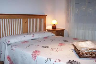 Cama o camas de una habitación en Apartamentos L´Era de Baix