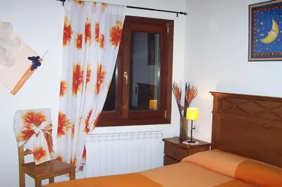 Cama o camas de una habitación en Apartamentos L´Era de Baix