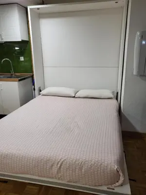 Cama o camas de una habitación en Apto VIELHA CENTRO Internet fibra