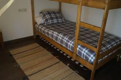 Cama o camas de una habitación en Acogedora casita en el Pallars