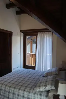 Cama o camas de una habitación en Acogedora casita en el Pallars