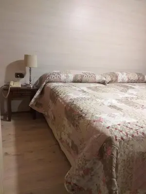 Cama o camas de una habitación en Hotel Giral