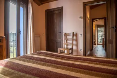 Cama o camas de una habitación en CASA BERNAT