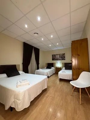 Cama o camas de una habitación en Hotel Restaurante El Colono