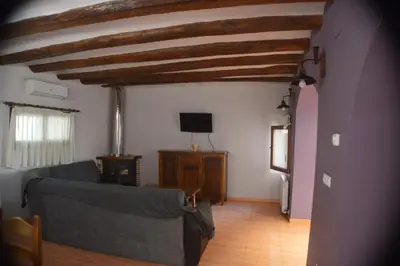 Una televisión o centro de entretenimiento en Casa Rural El Convento