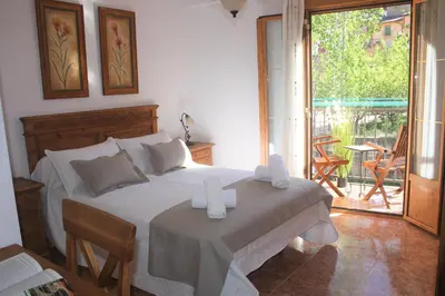 Cama o camas de una habitación en Casa Rural Arenal