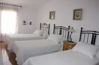 Cama o camas de una habitación en Casa Rural Arenal