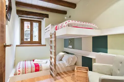 Cama o camas de una habitación en LUDERNA - Apartamento Pin Roi