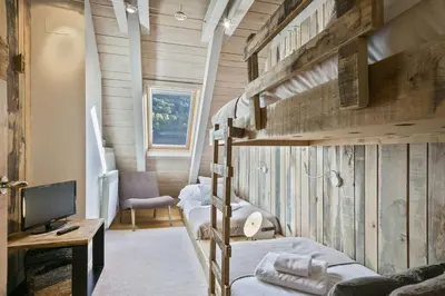 Cama o camas de una habitación en LUDERNA - Dúplex Pin Nere