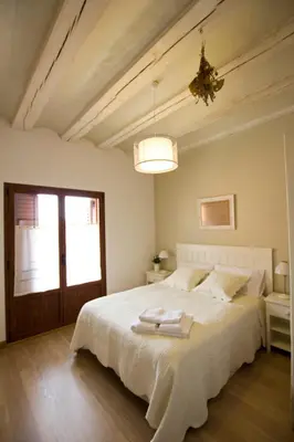 Cama o camas de una habitación en Casa Rural Villazón II - A 16 km de Pamplona