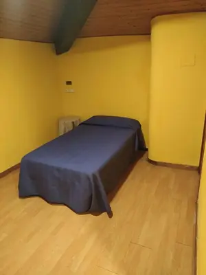 Cama o camas de una habitación en Hostal Rural Oricáin