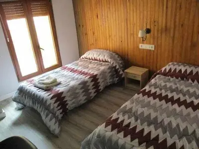 Cama o camas de una habitación en Casa Rural La Malena