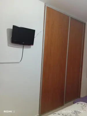 Una televisión o centro de entretenimiento en CASA el NOGAL